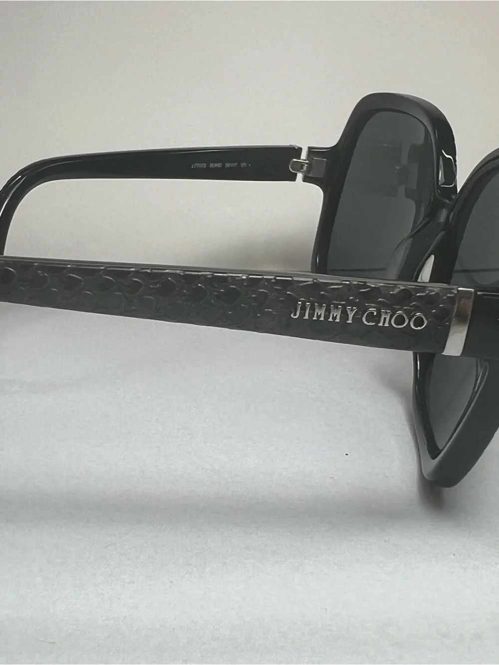 Jimmy Choo Black Frame Sunglasses with Blue Lenses